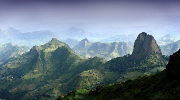 The Ethiopia landscape shows lush green mountains under a clear sky, HD Desktop Wallpaper