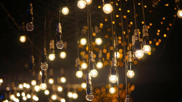 Warm fairy lights hanging from the ceiling creating a cozy glowing atmosphere