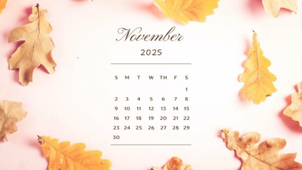 A simple November 2025 calendar on a pink background with dry leaves for a cozy Fall 2025