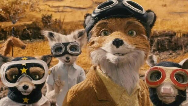 A group of Fantastic Mr Fox characters wearing goggles and costumes in a rural setting