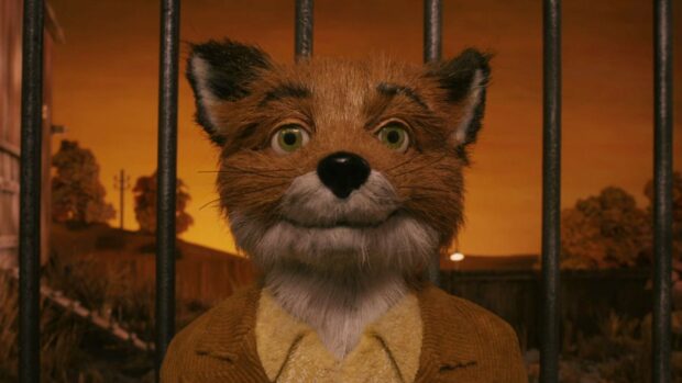 Fantastic Mr Fox character from the movie standing in front of bars at sunset with a thoughtful expression