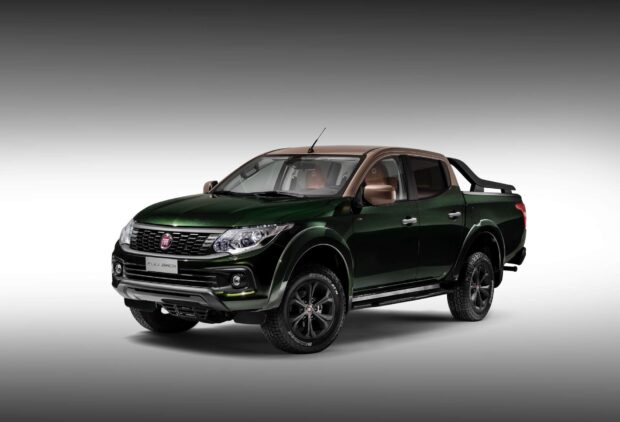 The Fiat Fullback in dark green is showcased on a neutral background highlighting its design and features, HD Desktop Wallpaper