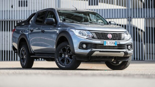A gray Fiat Fullback truck parked in front of a metal fence, HD Desktop Wallpaper