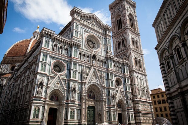 The Florence cathedral displays intricate marble facade and detailed sculptures in the city, HD Desktop Wallpaper