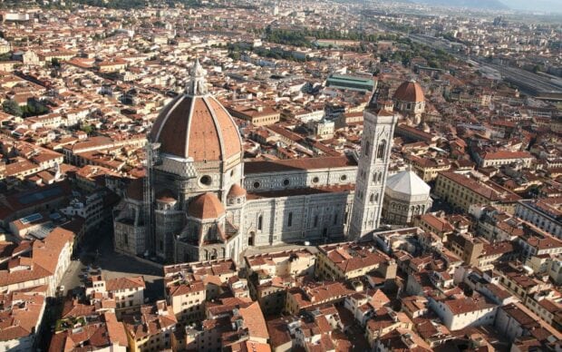 The Florence cityscape features the cathedral dome surrounded by terracotta rooftops, Florence Wallpapers, HD Desktop Wallpaper