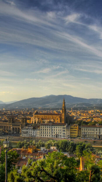 A scenic view of Florence showcases historic buildings under a blue sky with clouds, HD Phone Wallpaper
