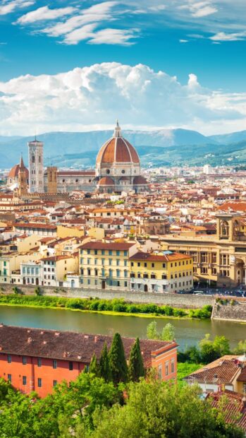 A vibrant view of Florence cityscape with famous cathedral dome under blue sky features Florence Wallpapers, HD Mobile Wallpaper