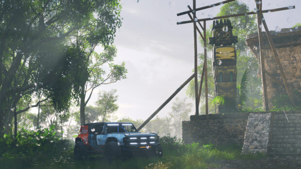 A Ford Bronco driving through a lush jungle near ancient stone ruins and a wooden totem structure