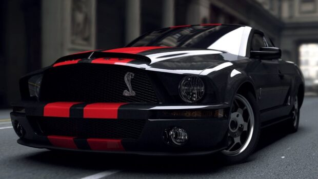 Black Ford Mustang with red racing stripes on a city street