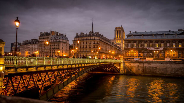 Evening view of Paris cityscape with the Seine river and historic architecture