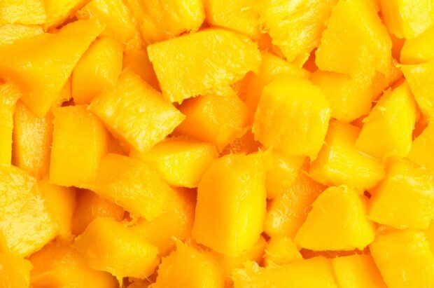 Fresh diced mango pieces showcase vibrant yellow color and juicy textures, HD Desktop Wallpaper
