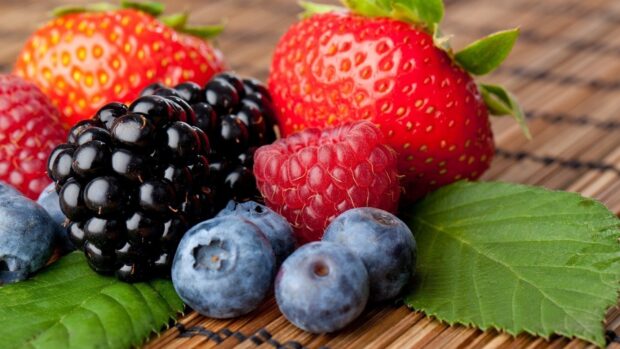 A close up of fresh mixed berries including strawberries, raspberries, blackberries, and blueberries, HD Desktop Wallpaper