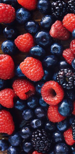 A close up of fresh mixed berries showing blueberries, raspberries, and blackberries, 2K Mobile Wallpaper