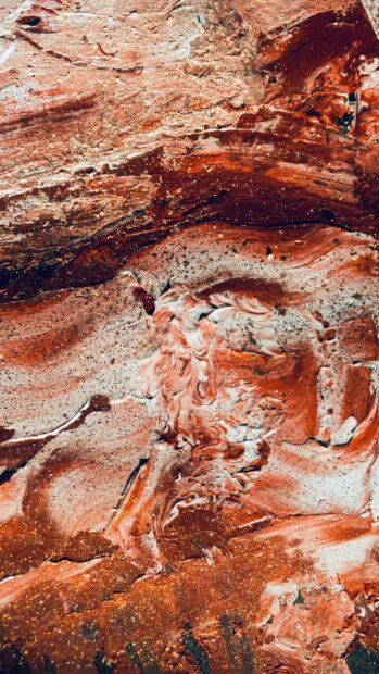 Detailed red and white mineral patterns showcasing unique geology textures