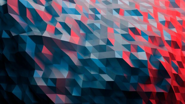 A vibrant geometric abstract design with blue and red 3D shapes forming a textured pattern