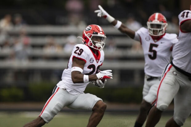 Georgia Bulldogs football player running with the ball during a game