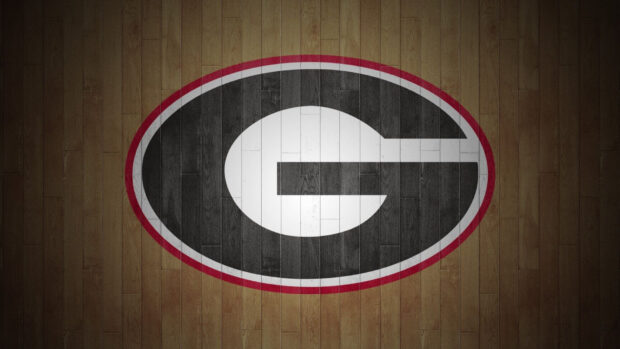 Georgia Bulldogs logo on a wooden floor showing team spirit and pride