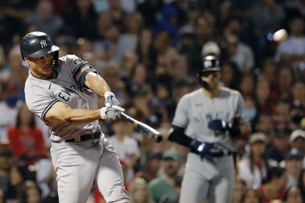 Giancarlo Stanton swinging a baseball bat during a New York Yankees game