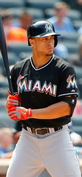 Giancarlo Stanton wearing Miami uniform ready to bat during a baseball game