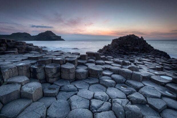 Northern Ireland, Giant's Causeway basalt columns are shown at sunset in Northern Ireland, HD Desktop Wallpaper