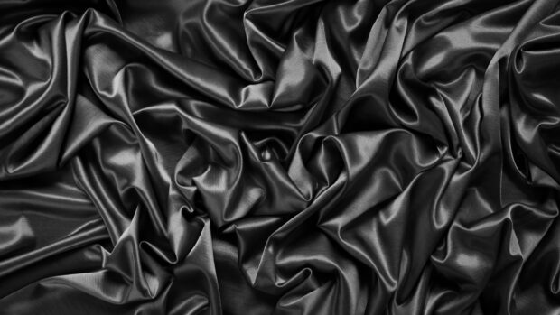The black silk fabric shows elegant folds and shiny texture, HD Desktop Wallpaper