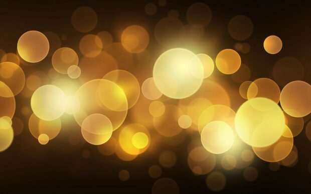 Soft glowing gold lights creating a warm and festive gold lights effect on dark background