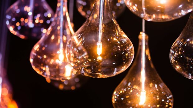Glowing gold lights creating a warm and bright atmosphere in a dark setting
