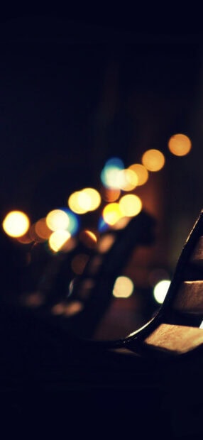 Soft gold lights bokeh effect with blurred background on a dark setting