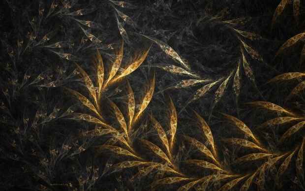 Delicate gold leaf designs spread across a dark abstract textured surface with intricate patterns