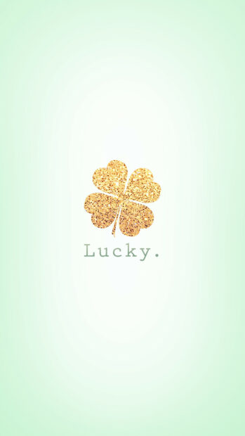 A gold leaf four leaf clover is displayed with the word lucky on a light background, HD Phone Wallpaper