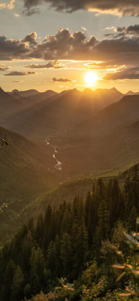 The golden sunset shines over Montana Wallpapers with a winding river below the mountain range, HD Wallpaper