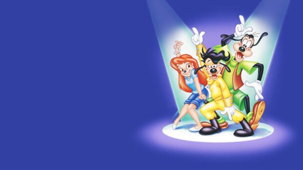Goofy and friends posing together under spotlights on a blue stage background