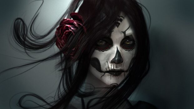 A goth woman with skull face paint and a red rose in her dark hair