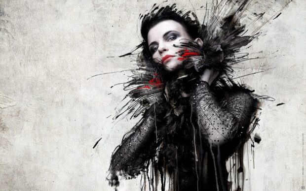 A goth fashion style with dark makeup and intricate feather details on a high contrast background