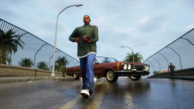 A character from Grand Theft Auto San Andreas walking on a wet street holding a gun with a classic car behind him