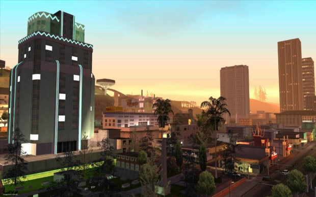 A cityscape featuring Vinewood sign and tall buildings from Grand Theft Auto San Andreas
