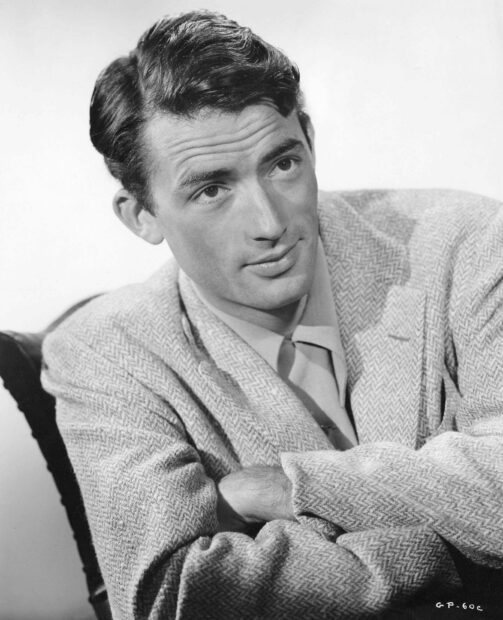 Gregory Peck in a thoughtful pose wearing a textured jacket, HD Desktop Wallpaper