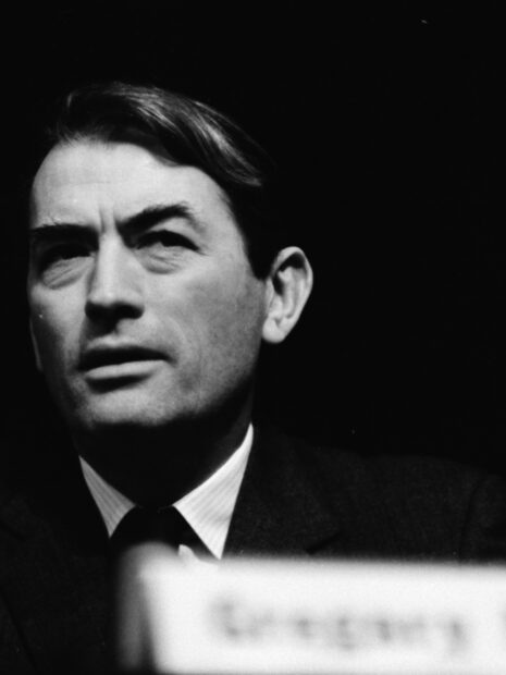 Gregory Peck is captured in a close up portrait with a serious expression, 2K PC Wallpaper