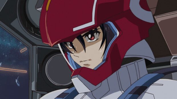 Close up of a Gundam Seed pilot wearing a red helmet inside the cockpit of a mobile suit