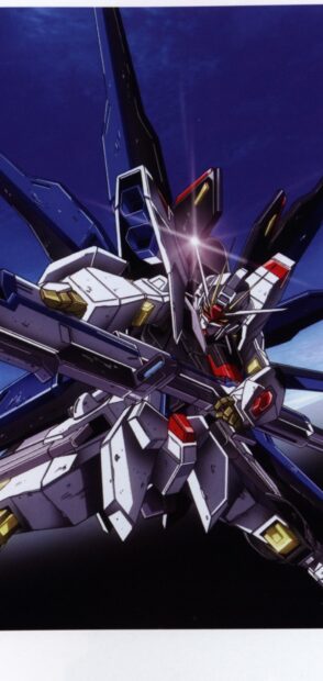 Gundam Seed mobile suit equipped with a large rifle against a dark blue sky background