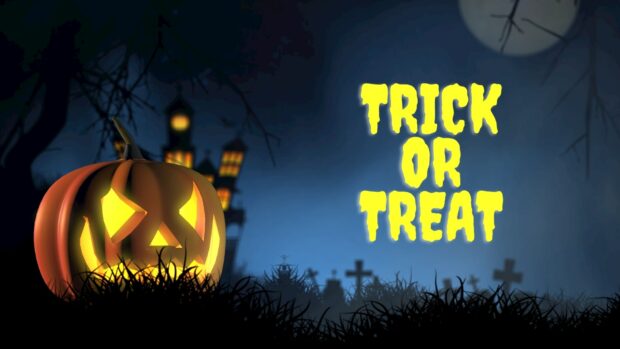 A spooky jack o lantern in a graveyard on the trick or treat night of Halloween 2025