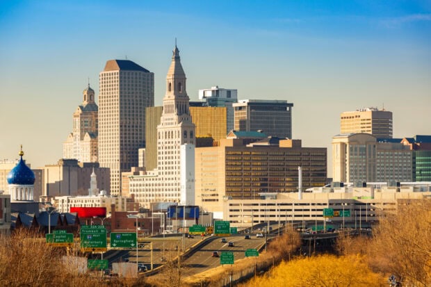 Hartford skyline with tall buildings under clear blue sky in high definition