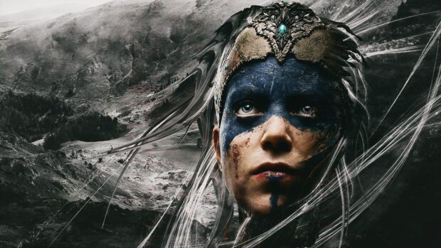 A close up of a fierce female warrior with detailed face paint and an ornate headpiece in Hellblade Wallpapers