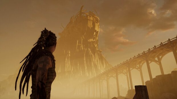 A warrior looks at a towering mystical structure in the distance in Hellblade Wallpapers, 4K Desktop Wallpaper
