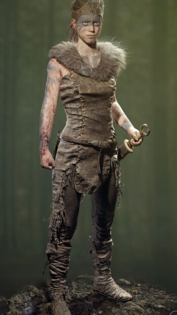 A warrior character with war paint and worn armor stands ready in a forest setting featuring Hellblade Wallpapers