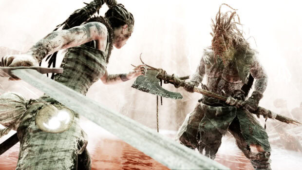A warrior armed with a sword confronts a monstrous opponent in Hellblade, 2K Desktop Wallpaper