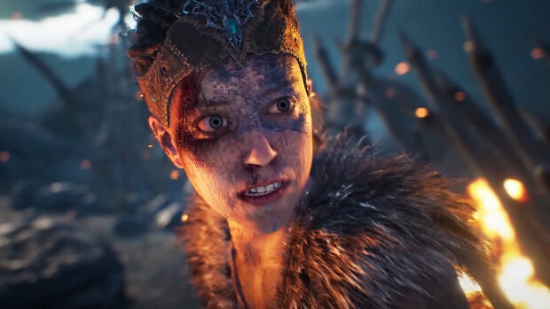 A fierce warrior with face paint and a crown from Hellblade HD Desktop Wallpaper
