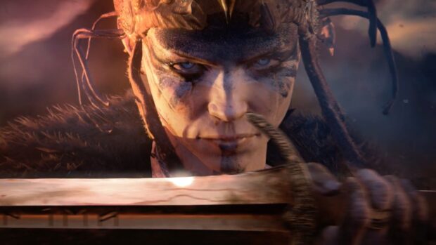 A fierce warrior from Hellblade grips a sword with focus, 4K Desktop Wallpaper