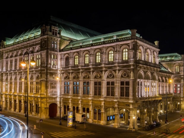 A historic building in Austria illuminated at night captures classic architecture and lighting, HD Desktop Wallpaper
