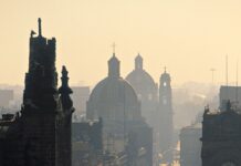 The street in Mexico City shows historic buildings and people walking with domes in the background, HD Mobile Wallpaper